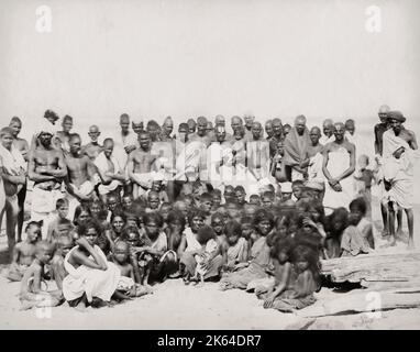 Vintage 19th century photograph: large group of Indiam men and children. Stock Photo