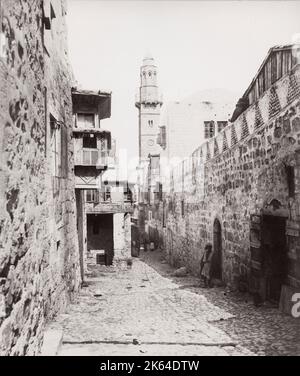 Vintage 19th century photograph: The Via Dolorosa is a processional route in the Old City of Jerusalem, believed to be the path that Jesus walked on the way to his crucifixion. Stock Photo