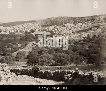 19th century vintage photograph: General view of Hebron, Holy Land, Palestine. Hebron is a Palestinian city in the southern West Bank, 30 km south of Jerusalem. Nestled in the Judaean Mountains, it lies 930 meters above sea level. Stock Photo