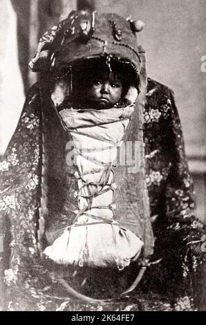 c.1890s/1900 - USA - Native American  - baby in a papoose Stock Photo