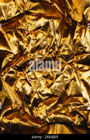 creased background distressed foil texture golden Stock Photo