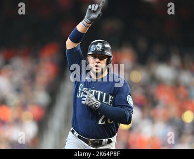 Seattle Mariners third baseman Eugenio Suarez (28) points skyward after  hitting a 2 run homerun in the seventh inning against the Houston Astros,  Wednesday, May 4, 2022, in Houston, Texas. The Astros