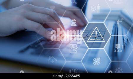 Work safety concept. Safety at workplace, safety first, hazards, protections, health, regulations  and group insurance.  Working standard process. Zer Stock Photo