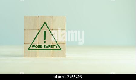 Work safety concept. Safety at workplace, safety first, hazards, protections, health, regulations  and group insurance.  Working standard process. Zer Stock Photo
