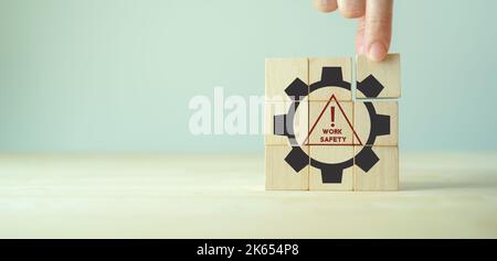 Work safety concept. Safety at workplace, safety first, hazards, protections, health, regulations  and group insurance.  Working standard process. Zer Stock Photo