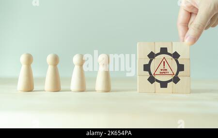 Work safety concept. Safety at workplace, safety first, hazards, protections, health, regulations  and group insurance.  Working standard process. Zer Stock Photo