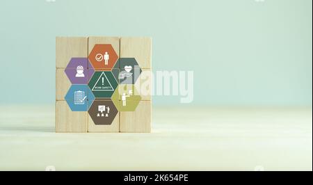 Work safety concept. Safety at workplace, safety first, hazards, protections, health, regulations  and group insurance.  Working standard process. Zer Stock Photo