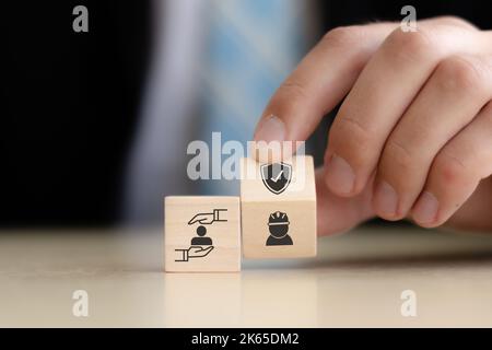 Work safety concept. Safety at workplace, safety first, hazards, protections, health, regulations and group insurance.  Working standard process. Zero Stock Photo