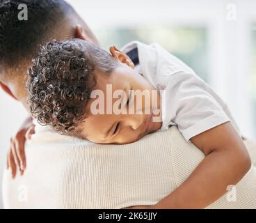 Never forget to cherish every single moment. a father carrying his son at home. Stock Photo