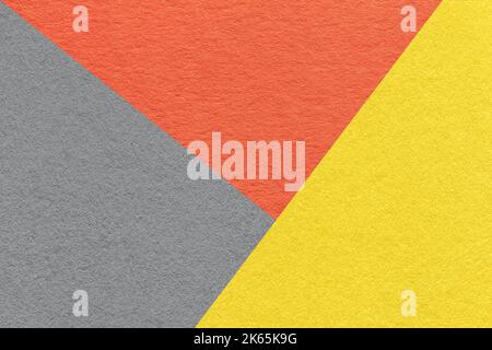 Texture of craft gray, yellow and orange shade color paper background, macro. Structure of vintage abstract cardboard with geometric shape and gradien Stock Photo