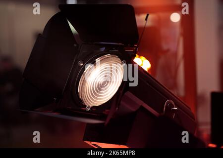 Stage spotlight or followspot with barn doors. Selective focus. Stock Photo