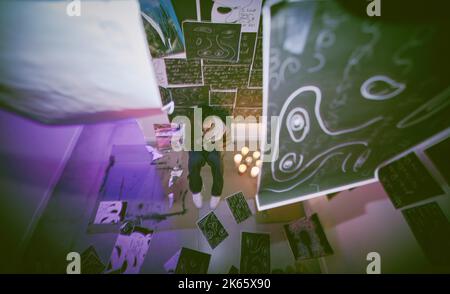 Asian man with mental disorder sitting alone at night feeling paranoid. Mixed race man mentally ill, feeling depressed and holding chest in his Stock Photo