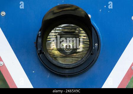 Broken light on a derelict railroad crossing warning sign Stock Photo