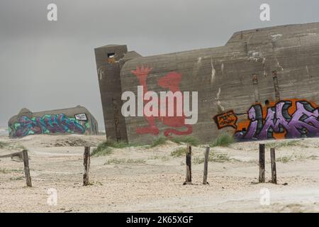 Graffiti art on a rotting German World War II bunker Stock Photo
