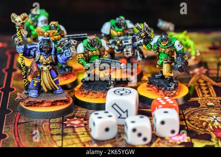 Miniature figures of role-playing board games to enjoy among several participants. Stock Photo