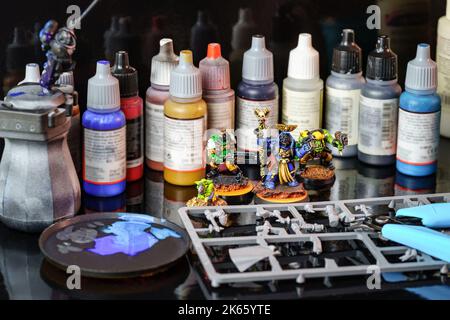 Set of products for painting and assembly of small figures used in role-playing board games. Stock Photo