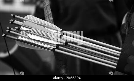 Medieval Set Of Old Colorful Wooden Arrows Hanging On Stand In Bag