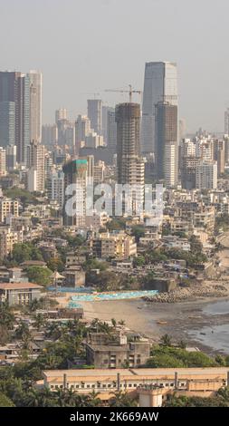 An aerial view of cityscape Mumbai surrounded by buildings and water Stock Photo