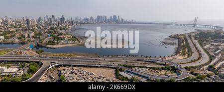 An aerial view of cityscape Mumbai surrounded by buildings and water Stock Photo