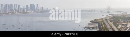 An aerial view of cityscape Mumbai surrounded by buildings and water Stock Photo