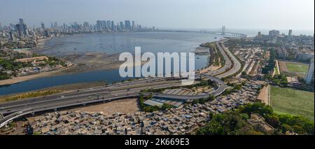 An aerial view of cityscape Mumbai surrounded by buildings and water Stock Photo