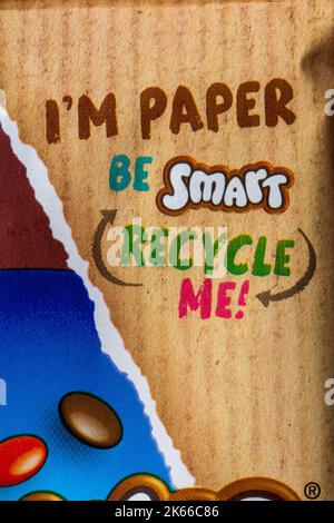 I'm paper be smart recycle me detail on bar of Nestlé Nestle Smarties chocolate bar Stock Photo