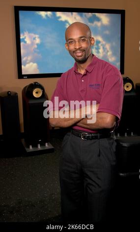 Electronic Home Enterainment Equipment Installer Stock Photo