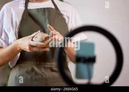 Clay modeling process, learning the basics of pottery. Cropped image of ...