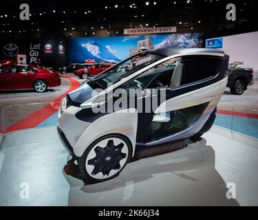 CHICAGO, IL/USA - FEBRUARY 6, 2014: 2014 Toyota i-Road  Personal Mobility Vehicle EV Concept car, Chicago Auto Show (CAS). Stock Photo