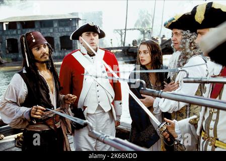 JOHNNY DEPP, KEIRA KNIGHTLEY, PIRATES OF THE CARIBBEAN: THE CURSE OF THE BLACK PEARL, 2003 Stock Photo