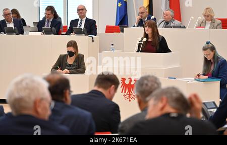 Potsdam, Germany. 12th Oct, 2022. Katrin Lange (SPD, M), Minister of Finance of the State of Brandenburg, speaks at the state parliament session about the 2023/2024 double budget. Among other things, the deputies discuss the 20223/2024 budget law of the state government, the labor market in Brandenburg and the PCK refinery in Schwedt. Credit: Bernd Settnik/dpa/Alamy Live News Stock Photo