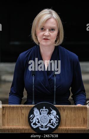 Liz Truss (Elizabeth Truss),  MP, British Prime Minister of the United Kingdom speaking on lectern,  Downing Street, London Stock Photo