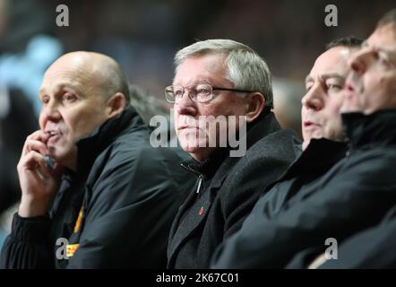 10th November 2012 - Barclays Premier League - Aston Villa Vs. Manchester United. - Manchester United manager Sir Alex Ferguson watches the match with his staff, including assistant Mike Phelan. Photo: Paul Roberts / Pathos. Stock Photo