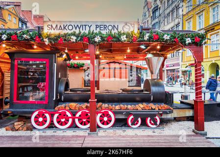 Wroclaw, Poland - December 2019: Famous polish Christmas Market in medieval Rynek Market Square. Stock Photo