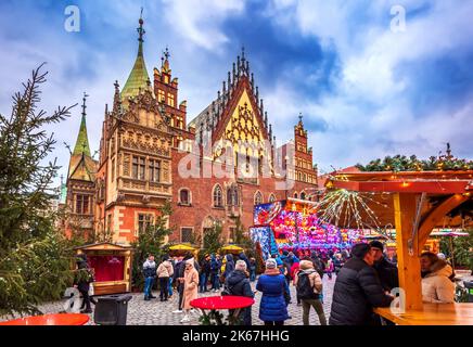 Wroclaw, Poland - December 2019: Famous polish Christmas Market in medieval Rynek Marquet Square. Stock Photo