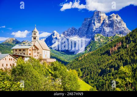 Colle Santa Lucia, Italy. Beautiful famous landscape with Chiesa di Colle Santa Lucia and Mount Pelmo. Belluno region, South Tyrol - Dolomites Mountai Stock Photo