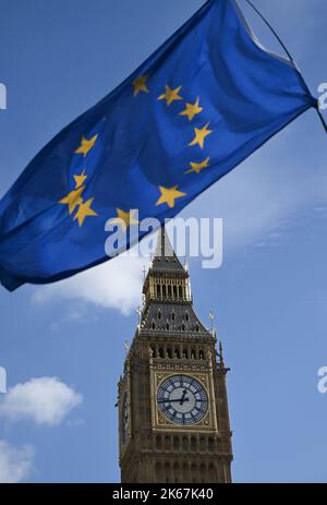 London, UK. 12th Oct, 2022. An EU flag flies during a demonstration against the Truss government in front of Big Ben in Westminster. Credit: Arne Dedert/dpa/Alamy Live News Stock Photo
