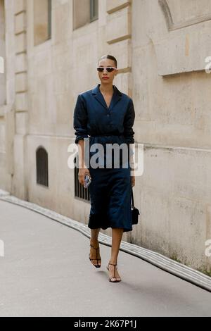 Street style, TyLynn Nguyen arriving at The Row Spring Summer 2023 show,  held at rue des Capucines, Paris, France, on September 28th, 2022. Photo by  Marie-Paola Bertrand-Hillion/ABACAPRESS.COM Stock Photo - Alamy