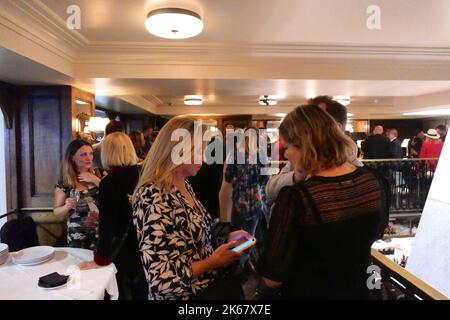 The FPA hosted the Autumn annual welcome back party at Macella Soho for FPA members with drinks and canapes after the August Summer break ... Stock Photo