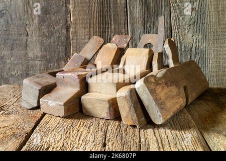 A set of tools on a wooden board. Vintage Home Woodworking Tools Stock Photo