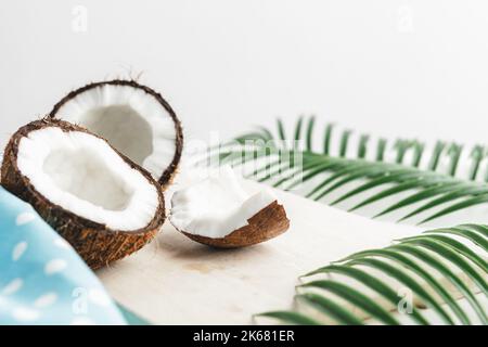 Creative layout made of coconuts and tropical leaves. Food concept Stock Photo
