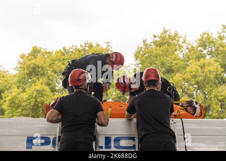 Two Just Stop Oil supporters climbed on top of a Metropolitan Police van outside Horse Guards Road in London on Wednesday (October 12) amid an ongoing Stock Photo