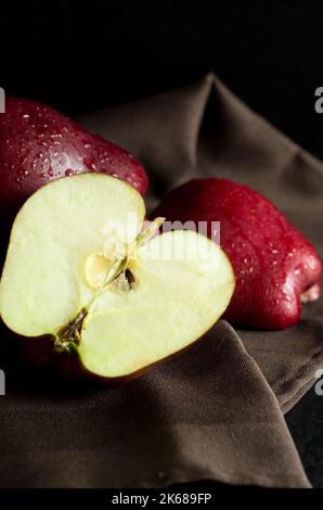 Beautiful Red Delicious Apples on Dark Background Vertical Stock Photo