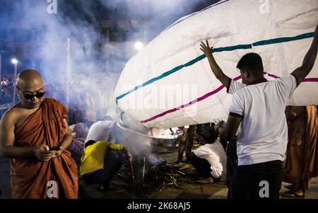 Dhaka, Bangladesh. 11th Oct, 2022. Lanterns being released during the Probarona Purnima Festival at Mukda Buddhist Temple, in Dhaka, Bangladesh, on October 11, 2022. (Photo by Md. Noor Hossain/Pacific Press/Sipa USA) Credit: Sipa USA/Alamy Live News Stock Photo