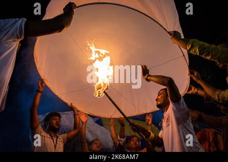 Dhaka, Bangladesh. 11th Oct, 2022. Lanterns being released during the Probarona Purnima Festival at Mukda Buddhist Temple, in Dhaka, Bangladesh, on October 11, 2022. (Photo by Md. Noor Hossain/Pacific Press/Sipa USA) Credit: Sipa USA/Alamy Live News Stock Photo