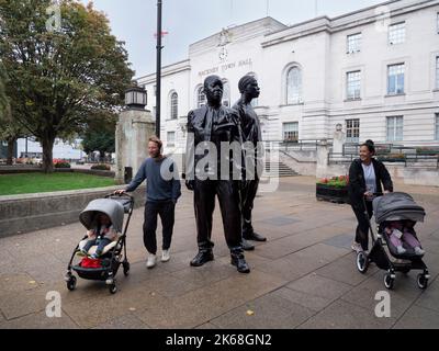 Hackney town hall, Hackney, London, United Kingdom, with sculpture Warm Shores by Thomas J Price, honouring the Windrush Generation was unveiled in June 2022 Stock Photo