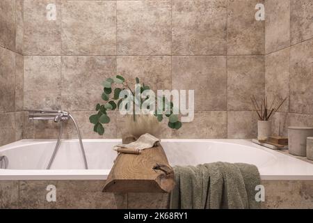 Modern Japandi bathroom interior design in earth tones, natural textures with wooden solid oak furniture. Japandi concept Stock Photo