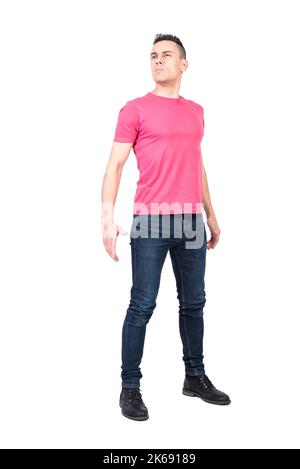 Self assured man looking at camera. White background Stock Photo