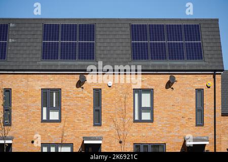 New modern apartment buildings with solar panels on the roof in London UK Stock Photo