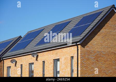 New modern apartment buildings with solar panels on the roof in London UK Stock Photo